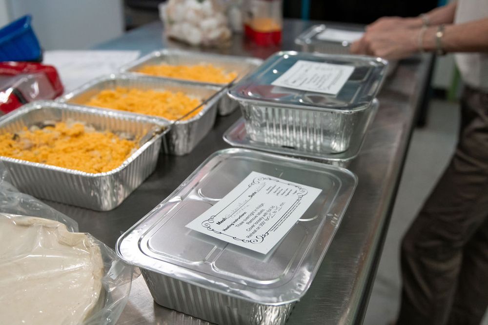 Stacks of labeled, freezer-ready meals